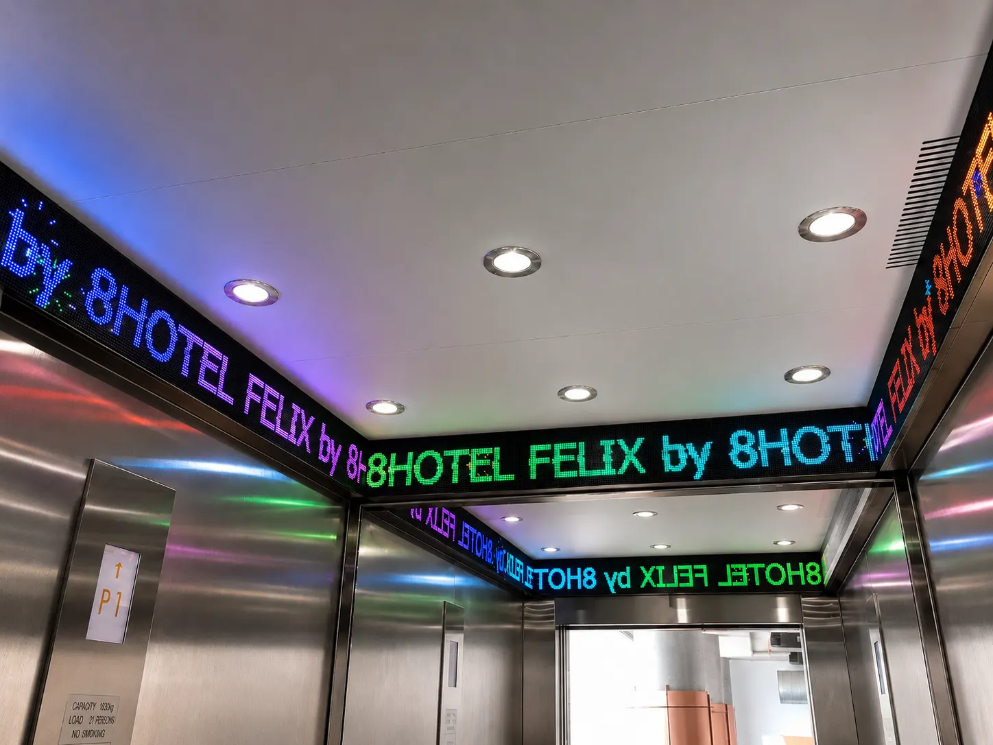 Interior LED feature display installed around the ceiling of a hotel elevator in Mascot, Sydney.